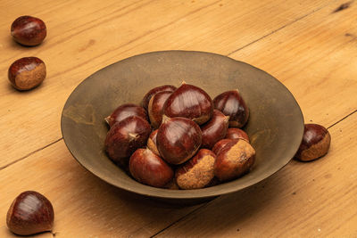 High angle view of fruits in plate on table