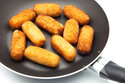 High angle view of eggs in plate