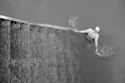 High angle view of man swimming in lake