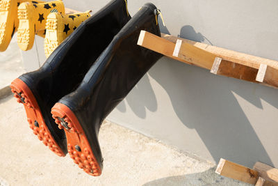 Low section of man at construction site on sunny day