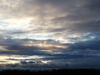 Low angle view of clouds in sky during sunset