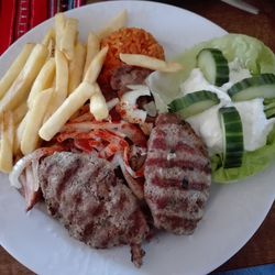 High angle view of meat and vegetables on plate