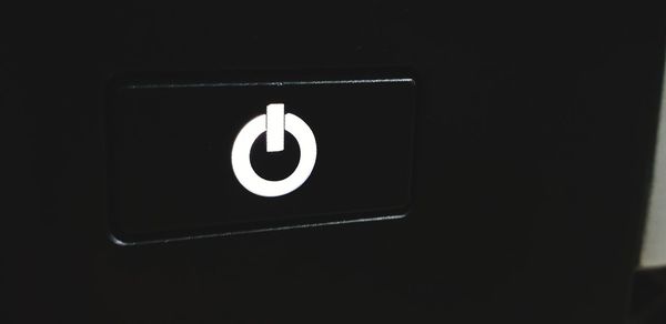 Close-up of text on black door