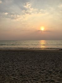 Scenic view of sea against sky at sunset