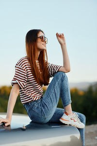 Young woman using mobile phone