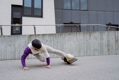 Side view of man exercising in gym