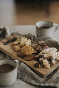 Various biscuits on wooden board