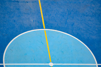 High angle view of basketball hoop against blue sky