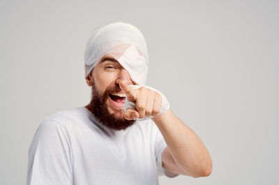 Portrait of man against white background