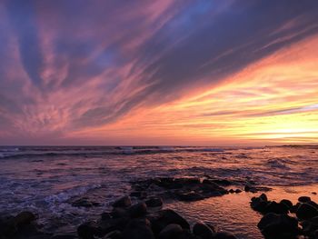 Scenic view of sea against sky during sunset