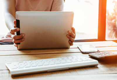 Man using laptop on table