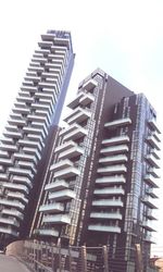 Low angle view of modern building against sky