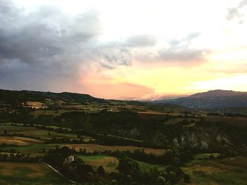 Scenic view of landscape against sky during sunset