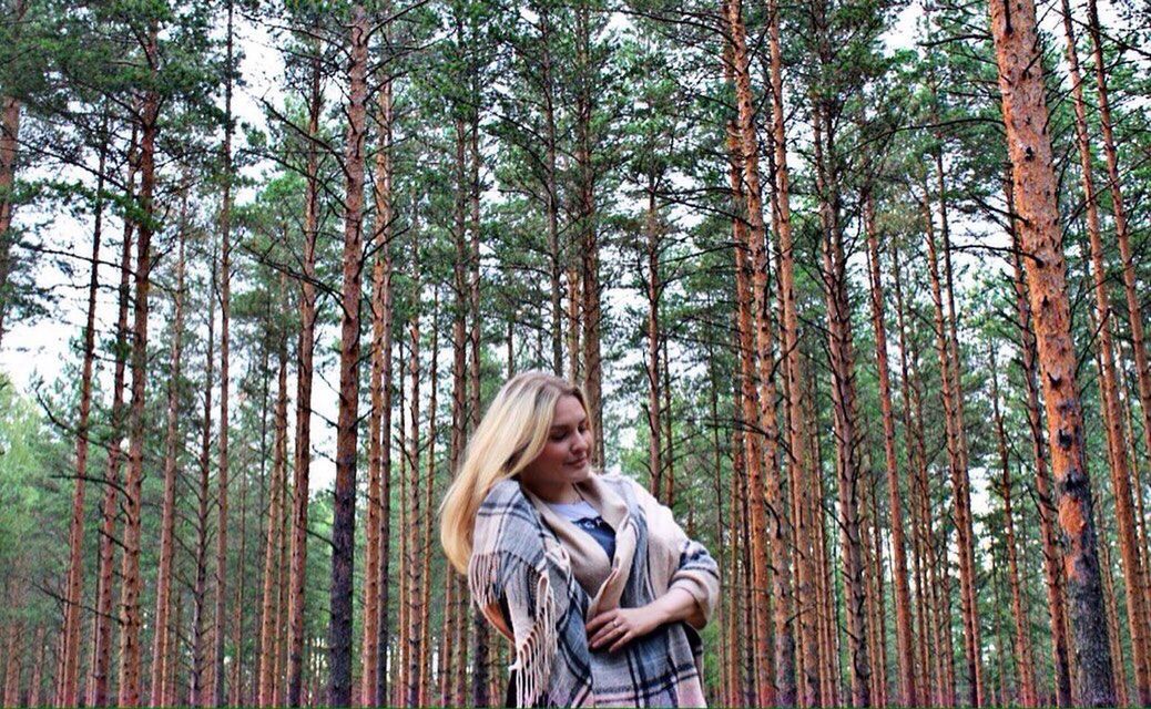 WOMAN IN A FOREST