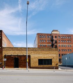 Buildings in city against sky