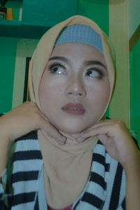 Portrait of beautiful woman at home