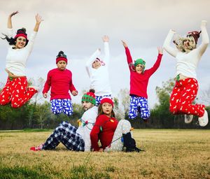 Funny portrait of family in christmas clothing