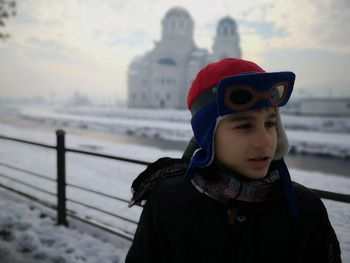 Boy wearing warm clothing during winter