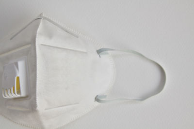High angle view of white container on table