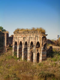 Old ruin building against clear sky