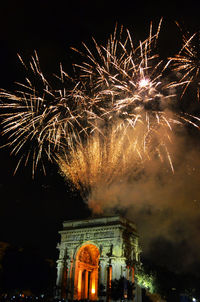 Low angle view of firework display