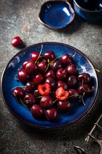 High angle view of cherries in bowl