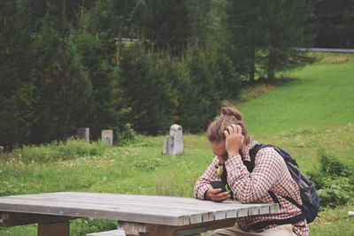 People relaxing on grass