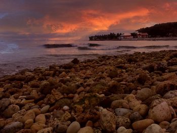 Scenic view of sea against cloudy sky