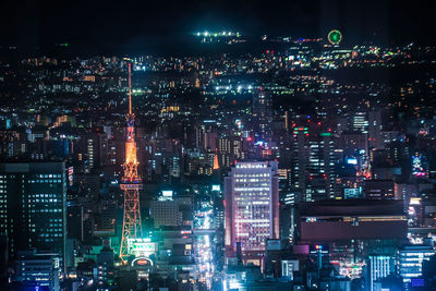 Illuminated buildings in city at night