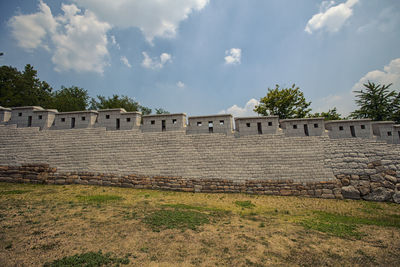 View of building against cloudy sky