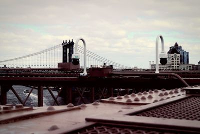 View of bridge against cloudy sky