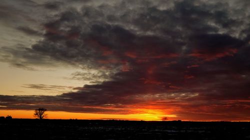 Scenic view of dramatic sky during sunset