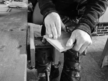 Close-up mid section of carpenter at work