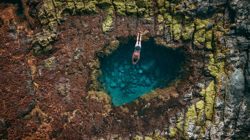 Man swimming in sea