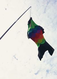 Low angle view of flag against sky