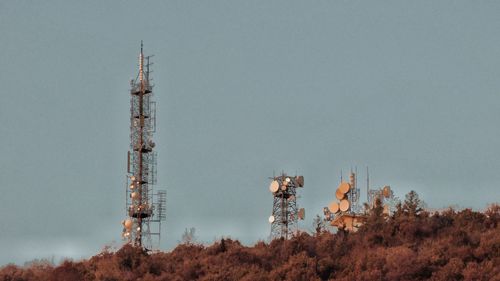 Communications tower against clear sky