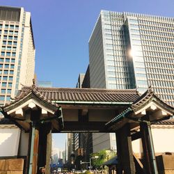 Low angle view of modern buildings against clear sky