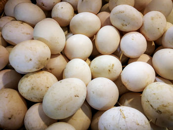 Full frame shot of onions for sale at market