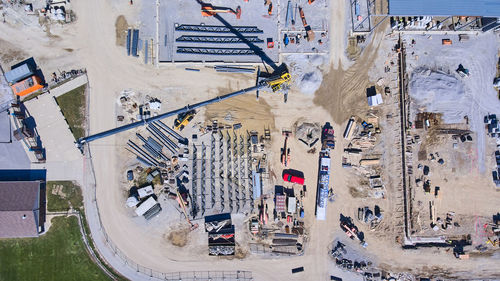 High angle view of road by buildings in city