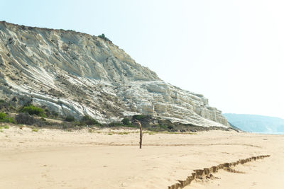 Scenic view of desert against clear sky