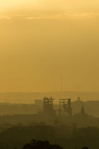 Scenic view of silhouette landscape against sky during sunset
