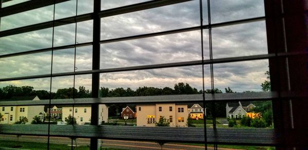 Cloudy sky seen through window
