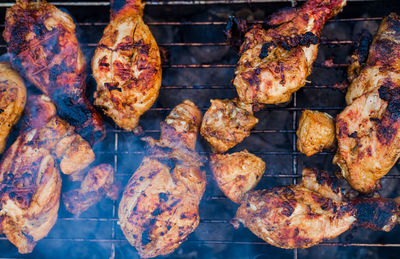 Close-up of meat on barbecue grill