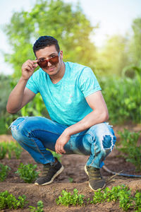 Portrait of young man wearing sunglasses