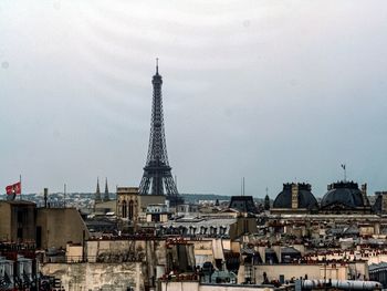 Buildings in city against sky