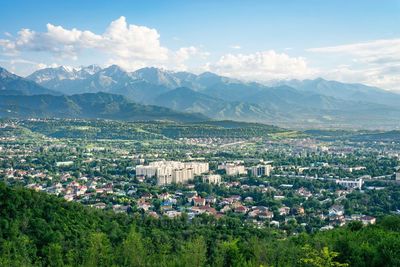 Aerial view of town against sky