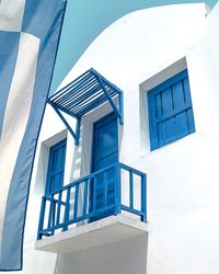 Low angle view of building against blue sky