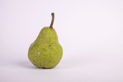 Close-up of fruit against white background