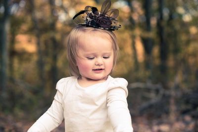 Close-up of cute baby girl wearing hat