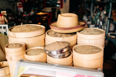 Stack of bamboo boxes for sale at market stall